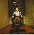 電気椅子に掛けられる男