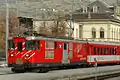 ブリーク駅停車中のDeh4/4 51号機が牽引する区間列車、同駅はスイス国鉄ブリーク駅前の路上に設けられている、2006年