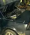 車体後部のエンジンフードの例、フィアット・X1/9。ミッドシップ特有のこのようなリッドを持つ場合は、エンジンフードやメンテナンスリッドと呼ばれることの方が多い。