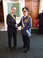 2012年7月15日、ロンドンのPolination Micronational Conferenceにて、モロッシア共和国のKevin Baughとともに写るNiels Vermeersch
