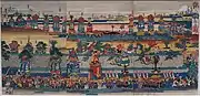 「神田大明神御祭図」　神田祭の山車行列。絵の右下隅、先頭の大榊と騎馬の神職の後に一番大伝馬町の諫鼓鳥、二番南伝馬町の幣猿など各町の山車が続く。歌川貞重画。