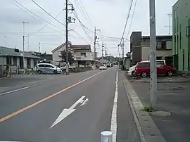 市道多摩橋通り(都道に格上げして、青梅線と立体交差化するため、用地買収が進んでいる。)