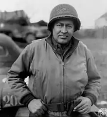斜めの切り込みポケットがある後期型のタンカーズ・ジャケット（1944年頃ジョージ・ウィンドル・リード・ジュニア准将）