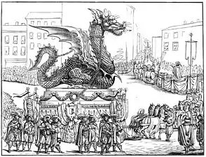 画像6：フランスの民間伝承(en:French folklore)に登場するドラゴン「グラウリ(en:Graoully)」にちなんだ、フランス北東部の都市メス (フランス)のグラウリ祭における行列。馬9頭立ての巨大な山車に乗ったグラウリの像が貴族の行列とともに街を巡っている。19世紀半ばの木版画。