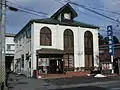 中居林支店：時計台をモチーフにしている。