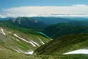 大白川ダムと三方崩山別山より、遠景は北アルプス