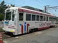 「トラスティ不動産販売」塗装のモ502（2009年5月14日）