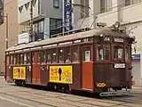 防犯啓発運動ラッピング電車となったモ164（2015年11月）