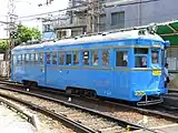 「鉄道喫茶・あびこ道」広告塗装　モ165（オリエント急行風塗装。2013年5月）
