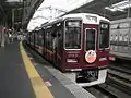 初代 宝塚線ラッピング車「宝夢」《1003F》（2016年4月 川西能勢口駅）