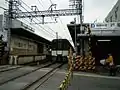 阪神芦屋駅を出る近鉄9020系