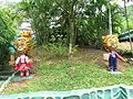 タイガーバームを手に持つトラのマスコットキャラクター