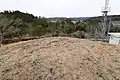 後円部墳頂後背に庄原市街地の沖積地、旧寺古墳群方向。