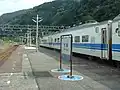 駅に停車中の419系電車（JR西日本時代）