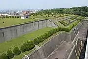 配水塔から名東区東部を望む。下の空地は配水池（1号配水池と2号配水池）である。