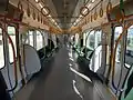 女性専用車の車内。一般車とは照明の色が異なる。