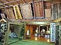 「安積惣社　宇奈己呂和気神社」や「八幡神社」などの扁額がある。