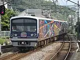 ラッピングを施された伊豆箱根鉄道3000系・3506編成