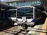 Jヴィレッジ駅開業記念ヘッドマークをつけた列車(2019年4月)