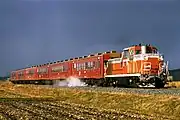 50系客車を牽引するDE10 1127（1993年11月）