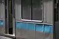 209系910番台の2枚窓と独自の仕切り板（2006年9月24日 新杉田駅）