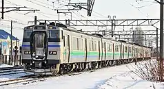 協調運転を行うキハ201系(前3両)と731系。(2009年1月26日、函館本線白石駅 - 苗穂駅)