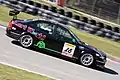 2006年イギリスツーリングカーチャンピオンシップのブランドハッチラウンドでカートワールドが運営するMG ZSを運転するヒューズ。