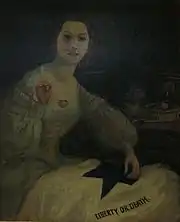 Portrait of an attractive young woman in mid-19th century dress sewing a flag that says "Liberty or Death"