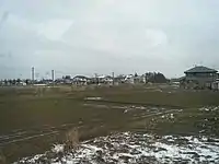 羽越本線と米坂線の分岐点。米坂線車内より。