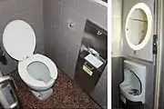 床据え付け式の洋式トイレ当初は繰り出し式カバータイプだった