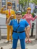 No.15 ようこそ こち亀の街へ！両津・中川・麗子がお出迎え！像