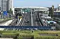 上社ICから庄内川左岸までは半地下とトンネル区間が続く。奥は上社JCT。