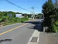 箕輪交差点から起点側へ200m程進んだ所 - 奥が起点側