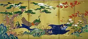 「四季花鳥図屏風」 白鶴美術館蔵。ほんらい大和絵の手法であった金箔貼付け(金碧障壁画)で鳳凰や孔雀、四季の花々を描いた六曲一双の屏風。狩野永徳の作と伝わる。