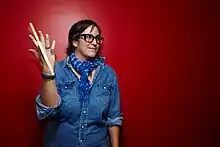 Schellenbach twirling a drumstick