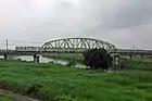 塗替塗装前の荒川橋梁。薄緑色に塗装されている。