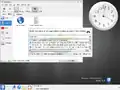 KDE 4 Beta 1におけるOxygen。実行ダイアログ、clock plasmoid、Dolphinにアイコンが見える。