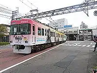 浜大津駅を発車する京阪700形『けいおん!』放送5周年ラッピング編成(2014年10月11日)
