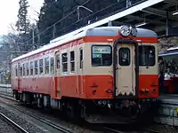 国鉄一般色に復元されたJR西日本キハ52 115（南小谷駅 2007年3月24日）