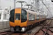 阪神大石駅付近を走行する近鉄特急22600系Ace(エース)
