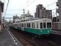琴平線の複線区間を走る長尾行きの600形電車。（2006年）