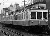 非貫通型 34+33+20形2334の台車はころ軸受化されたBrill 27-MCB-2Xへ交換済み。 瓦町付近