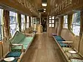 KT-203「KUMA-1」車内トイレ部分の壁にアクリル封入標本を設置している