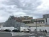 南口ロータリーの東側から見た再建中の旧駅舎（2019年9月）