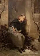 薪束を集める女性