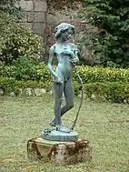 花を摘む娘