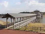 五所川原市の大沼溜池に架かる東日流館橋(日本一の屋根付き木橋)