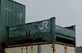 片側開きドアタイプの全景。1999年3月、大阪／旧、百済貨物駅にて撮影。