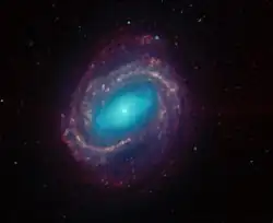 スピッツァー宇宙望遠鏡による棒渦巻銀河 M58の赤外線画像提供:SST/NASA/JPL
