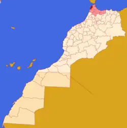 タンジェ=テトゥアン=アル・ホセイマ地方(薄い赤)とタンジェ=アシラー県(赤)の位置の位置図